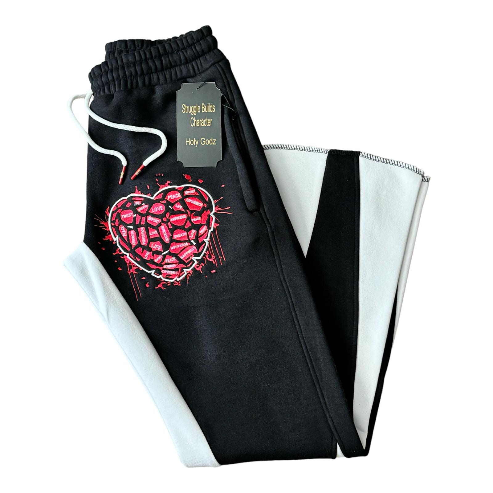 The Heart Felt Flare Joggers by Holy Godz. Real pain. Real love. Real survival. The statement joggers for those who’ve been through it all and still stand.