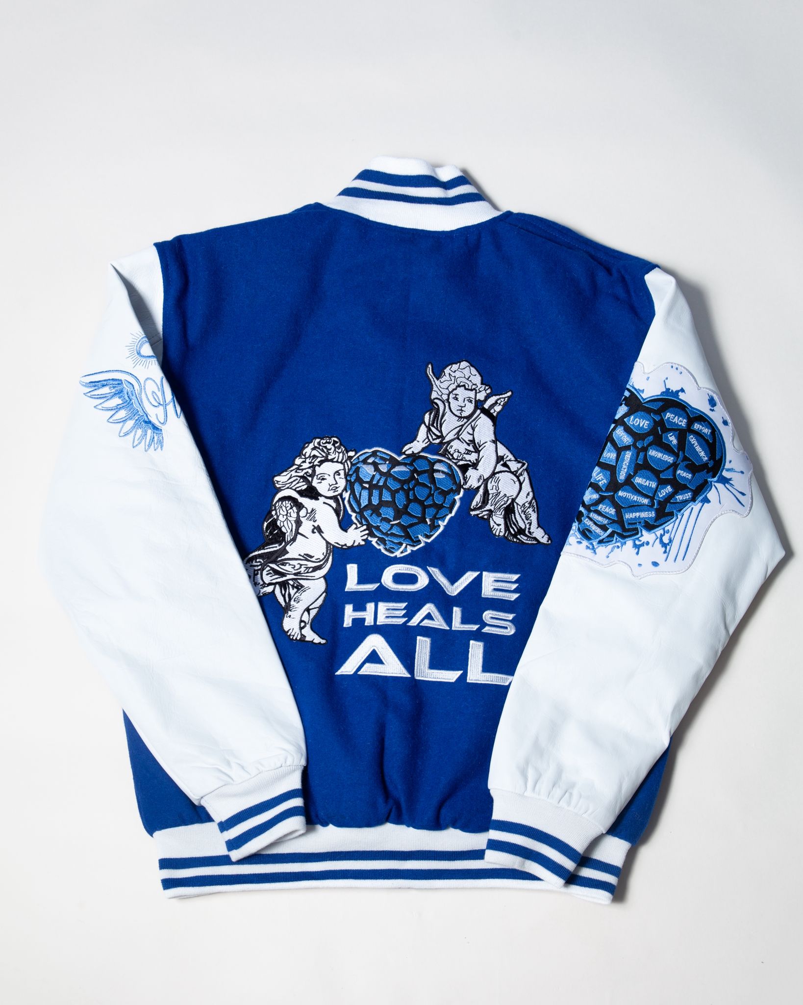 LOVE HEALS ALL VARSITY JACKET Holy Godz