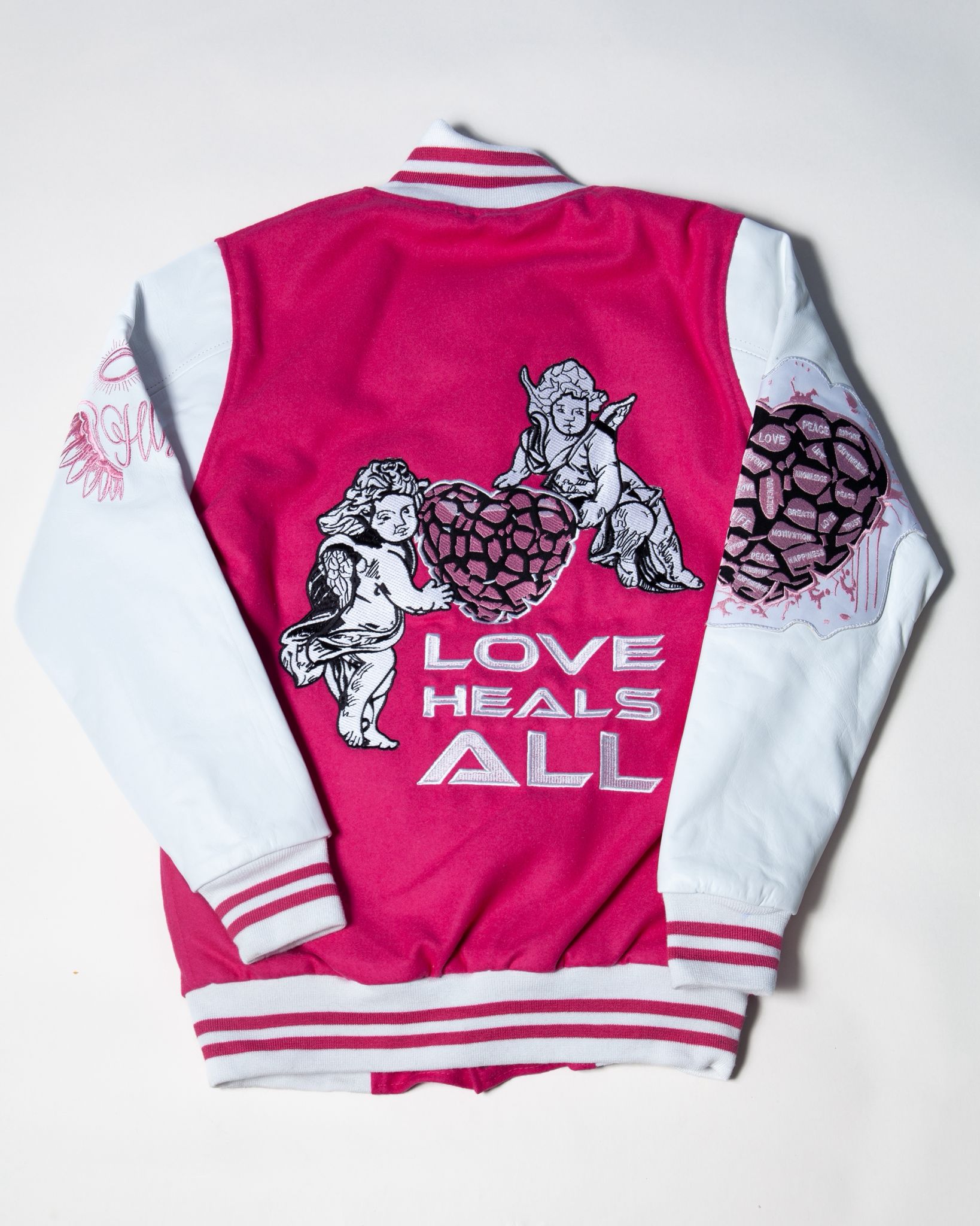 LOVE HEALS ALL VARSITY JACKET Holy Godz