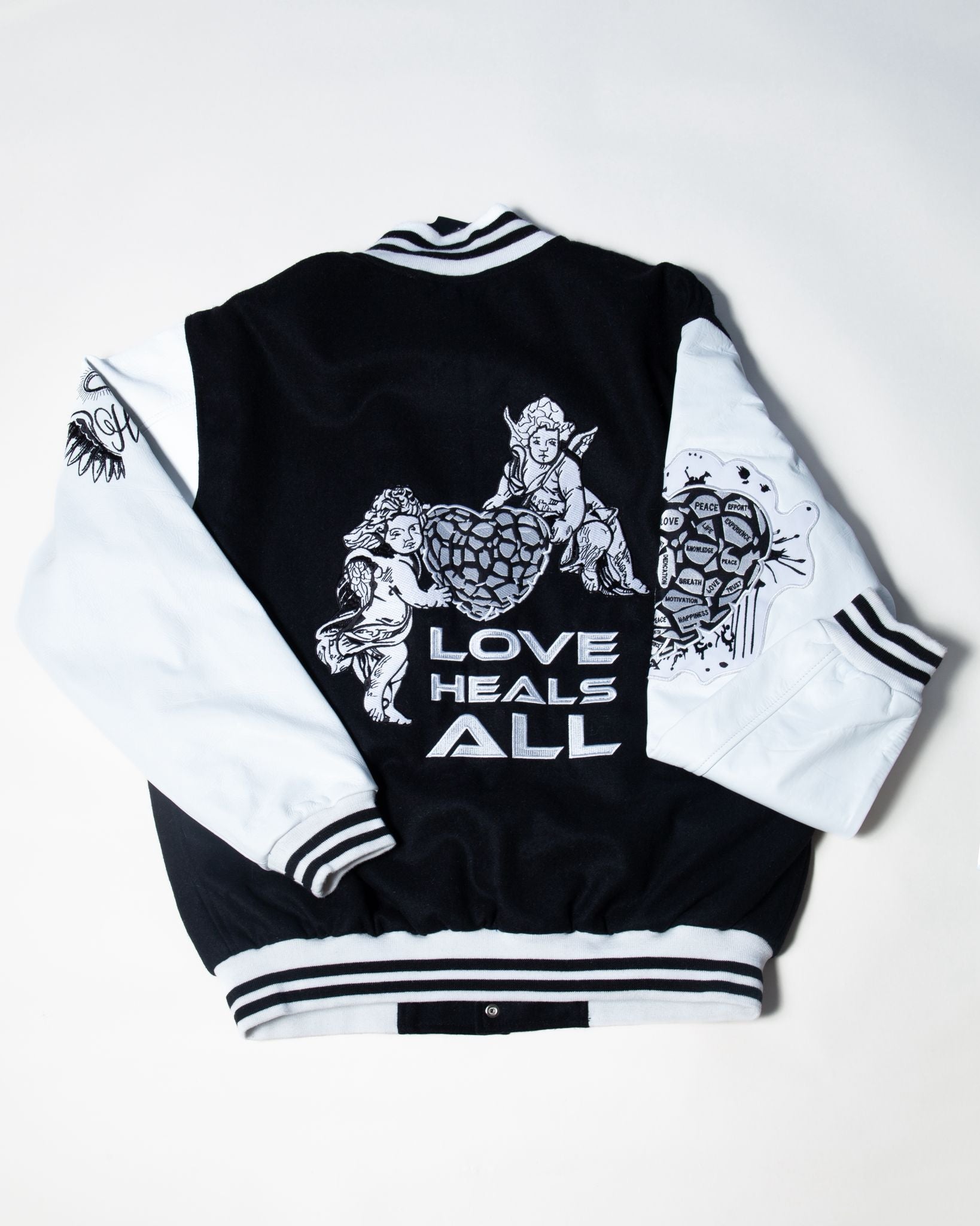 LOVE HEALS ALL VARSITY JACKET Holy Godz
