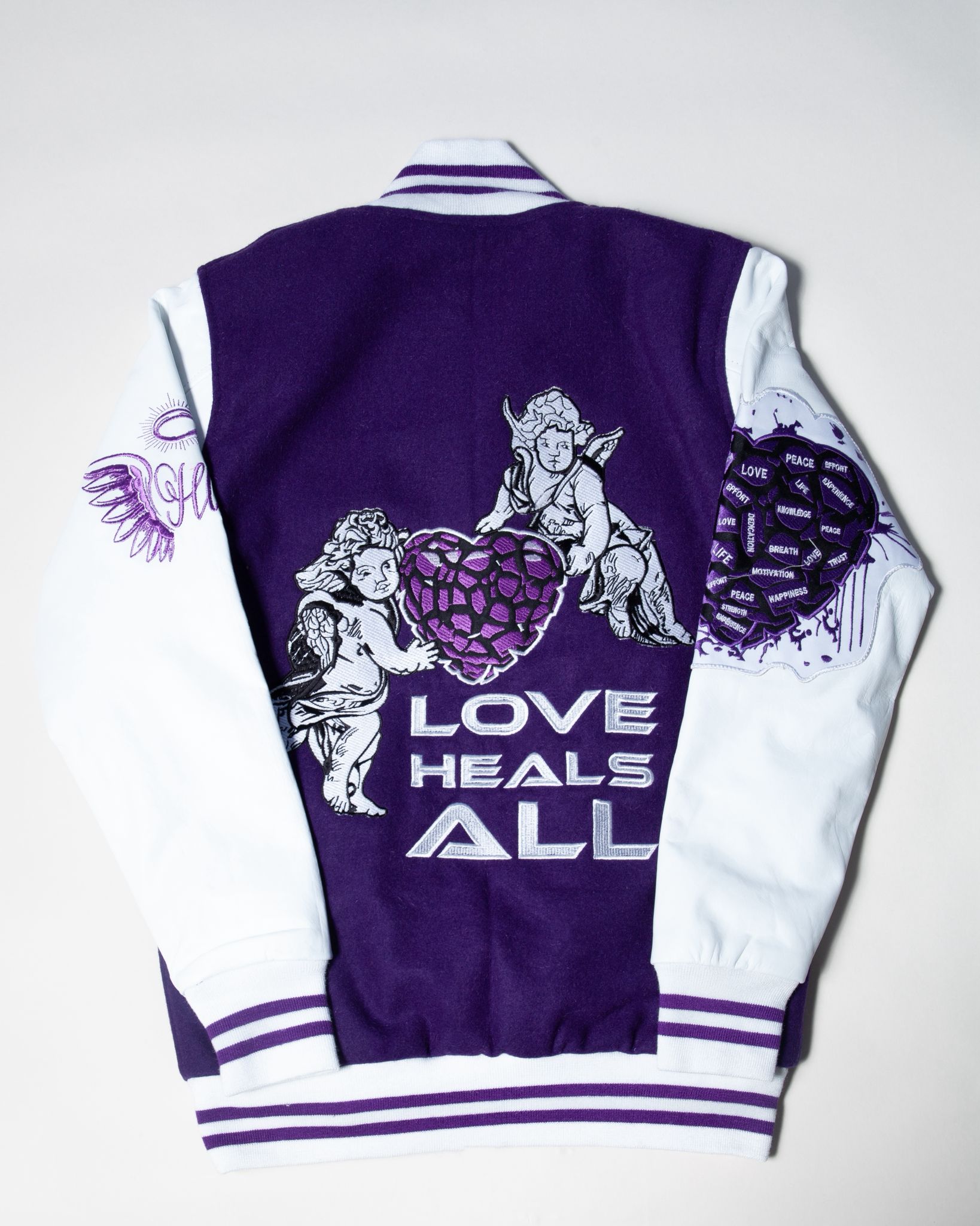 LOVE HEALS ALL VARSITY JACKET Holy Godz