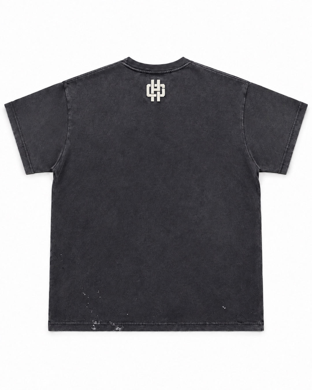 Back of the GOD IS IN ME Tee with cream HG emblem below collar and paint accents near hem