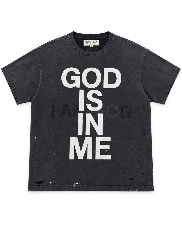 GOD IS IN ME Tee front with cracked white lettering, black glitter I AM GOD graphic and distressed hem